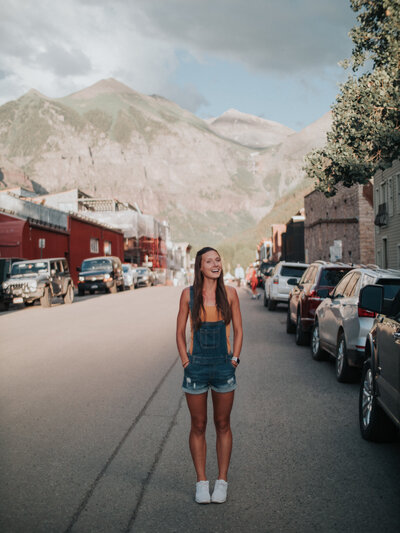 woman standing in the road