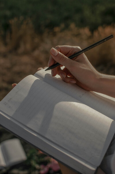 writing in journal for mindfulness retreat in NYC and PA