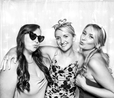 2 girls posing against a bohemian backdrop, for a 18th birthday party entertainment using the Selfie pod party photo booth