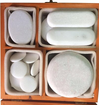 Hot Stone Set - A smooth, high-quality set of hot stones ideal for massage therapists looking to offer deeper relaxation. (Category: Hot and Cold Stones)