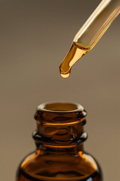 Amber medicine bottle with a glass dropper