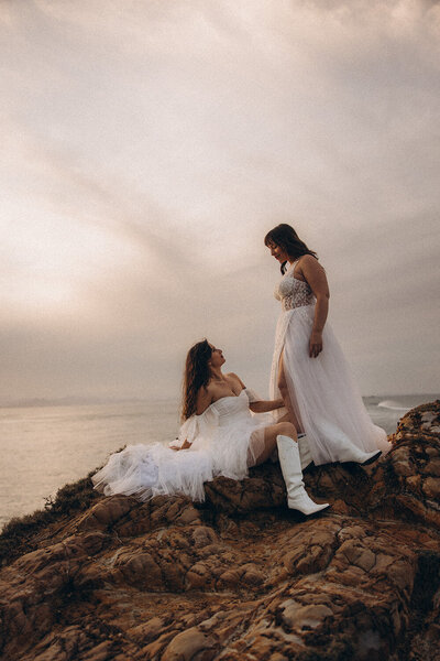 Lesbian Elopement on a cliff face at golden hour, intimate and emotive captured by Sunshine Coast Photographer 