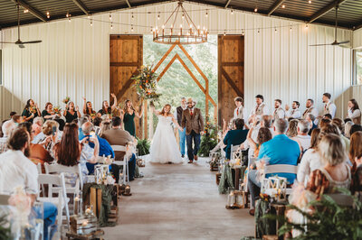 WEdding at The Rosewood Venue in Mt Vernon Texas dallas wedding photographer barn wedding outdoor wedding ceremony first kiss east texas wedding venue