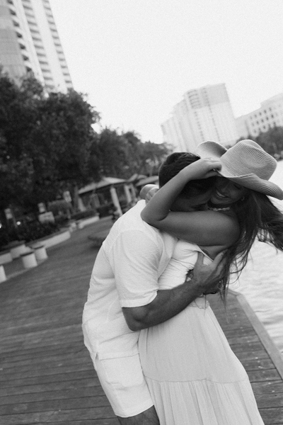 Black and white couples documentary engagement photo at the boardwalk | Sush Digital Media