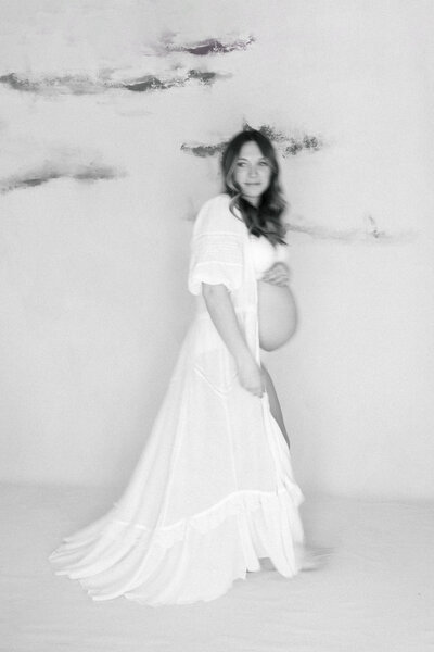 A studio maternity session with husband and wife.