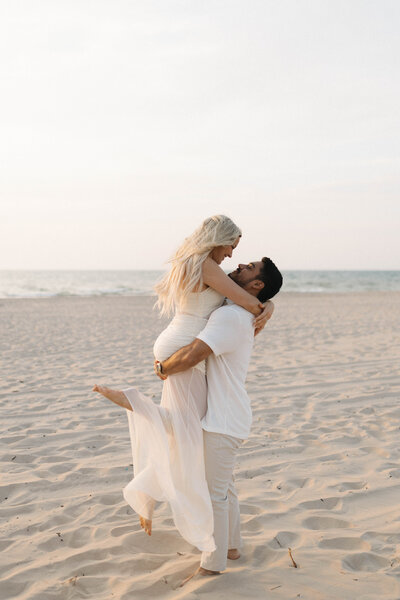 sunset beach engagement session in michigan