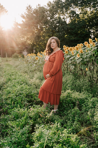 woman posing in stow ma at sunflower field