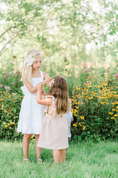 sisters-playing-in-a-garden