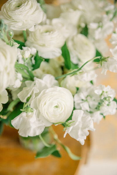 Neutral floral arrangement with greenery
