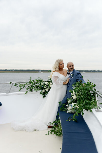 Bride and groom on the Carolina Girl Yacht for their wedding in Charleston SC