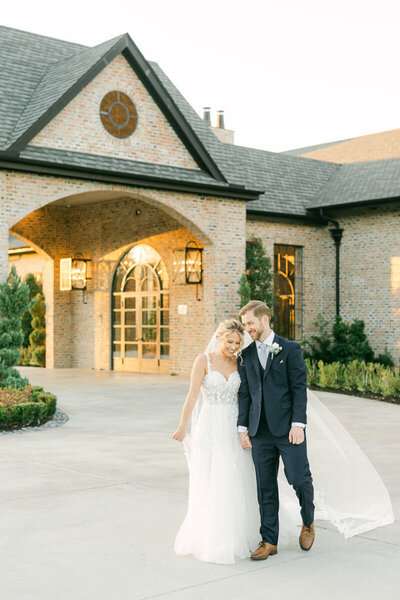 couple walking outside iron manor