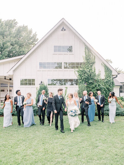Dallas-Fort Worth Wedding Photographer | DFW Photographer Rae De Lain Weddings Light and Airy | Wedding party waling at The Rosemary