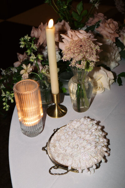 Sophisticated wedding table decor at The Ritz-Carlton Sarasota, Florida—luxurious floral arrangements, candlelit ambiance, and refined details designed by Watters & Co. Events