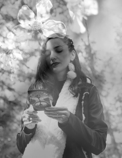 Black and white photo collage of pet psychic reading tarot cards for animal communication session. 
