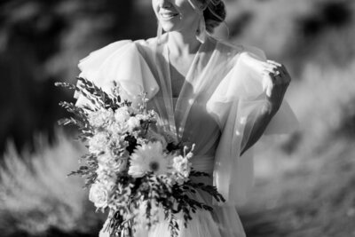 Calgary luxury photographer beautiful bride with loose floral bouquet