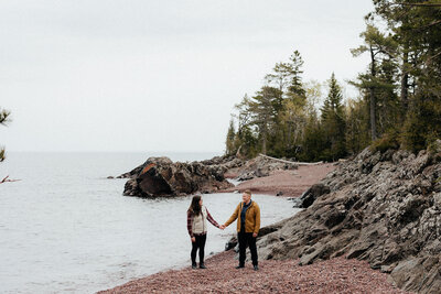 spring engagement photoshoot in a grassy field in Michigan