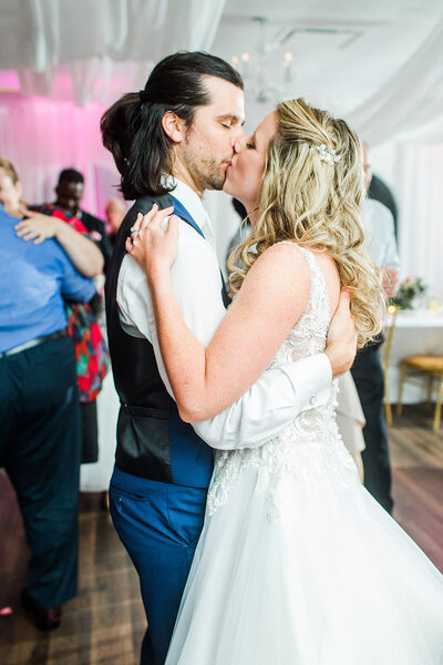 bride and groom dancing at reception