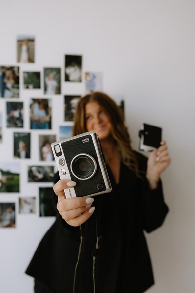 lauren gaubert holds camera