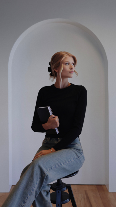 business women holding planner