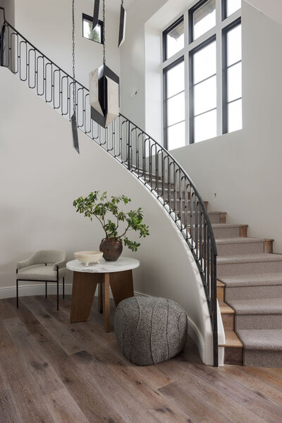 completely reshaped staircase in Granite bay custom home - interior design by Sacramento base interior designer  Christin Balzer, who specializes in full remodels and new  construction homes