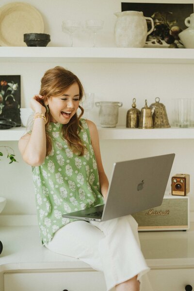 woman looking at computer