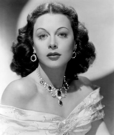 A timeless still featuring the iconic Hedy Lamarr in Let's Live a Little, capturing her elegance and charm in a vintage cinematic moment.