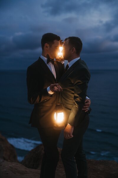 grooms with lanterns in san diego
