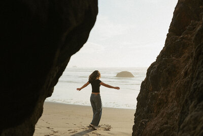 girl standing on bridge in columbia river gorge in oregon
