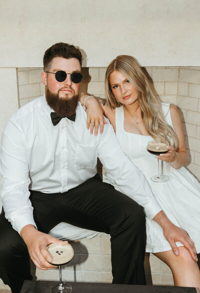 bride and groom holding eachother