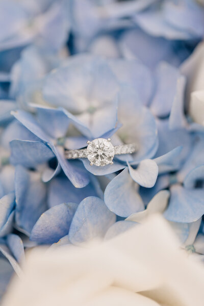 Large round diamond ring with light blue hydrangeas