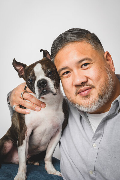 Tender moment between child and dog — fine art family photography in Marin County