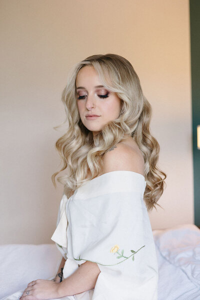 Bride styled with natural tones and soft glam makeup — subtle, flawless finish by Klover Beauty’s Maryland makeup team.