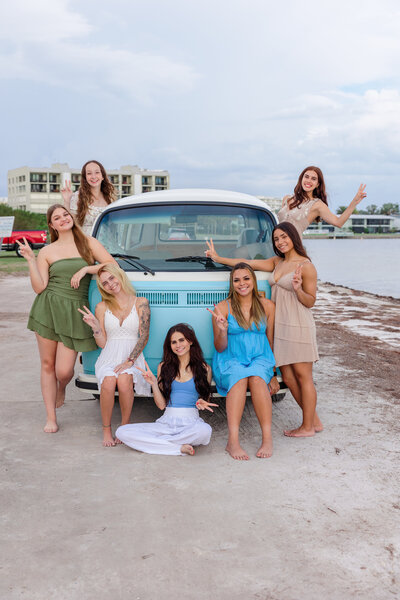 Seniors standing in front of VW Van in Dunedin