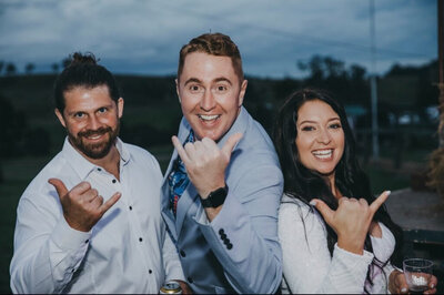 Smiling couple at outdoor wedding ceremony