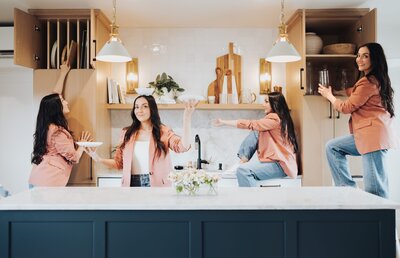 Woman in salmon colored blazer is photoshopped in 4 different positions organizing a kitchen.