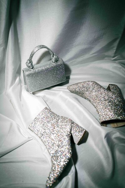 bridal silver bag and shoes on a silly cloth