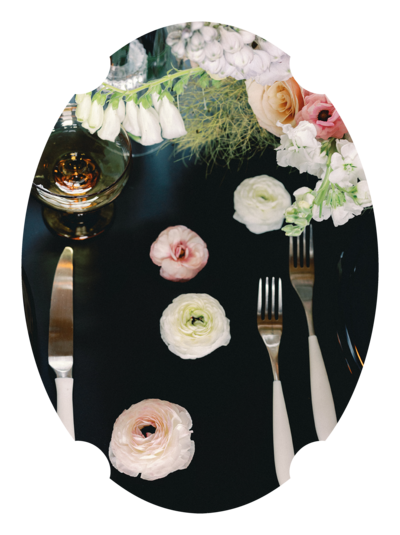 Close-up photo of a table setting with florals