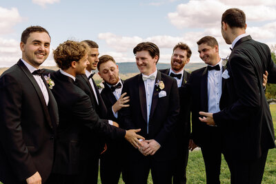 Groom with his groomsmen before walking down the aisle