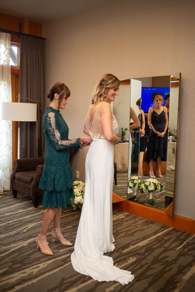 bride getting ready in willows lodge woodinville venue