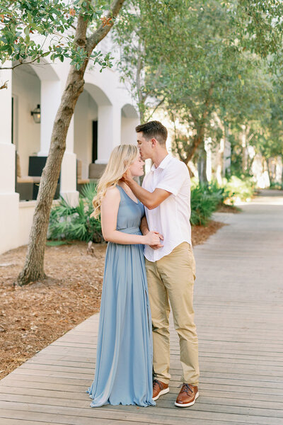 Engagement photo on boardwalk in Rosemary Beach 30a