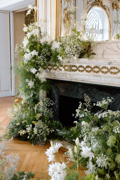 Floral fireplace design for milestone celebration — event design NJ & NYC