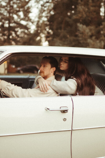 Vintage couple editorial with vintage car.