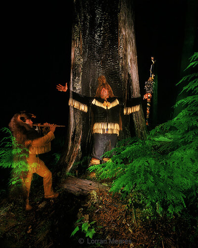 Native American spiritual leader Cha-das-ska-dum Whichtalum and Jewel Praying Wolf James bless a sacred site on Mount Baker - Light painted image Copyright Lorran Meares