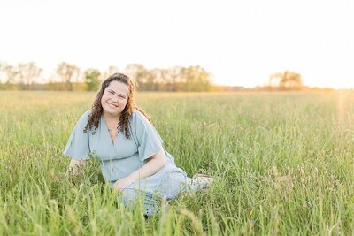 Sara Sniderman sits in Field in Natick Massachusetts