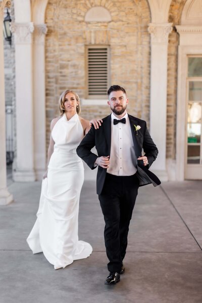 Captured in the serene settings of West Baden Springs Resort, John and Mike share a spontaneous laugh, embodying the joy and authenticity of their wedding celebration.