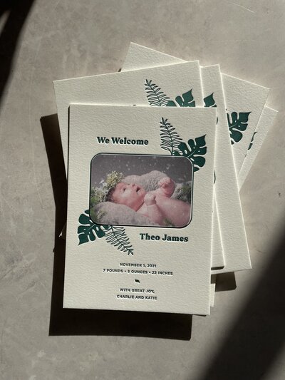 jungle inspired green letterpress baby announcement with baby photo