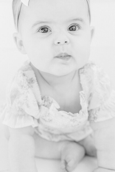 black and white image of baby girl