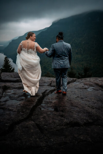 couple is about to get married and elope on top of indian head mountain in the adirondacks of upstate new york
