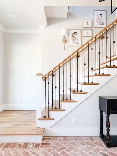 Staircase family photo gallery wall