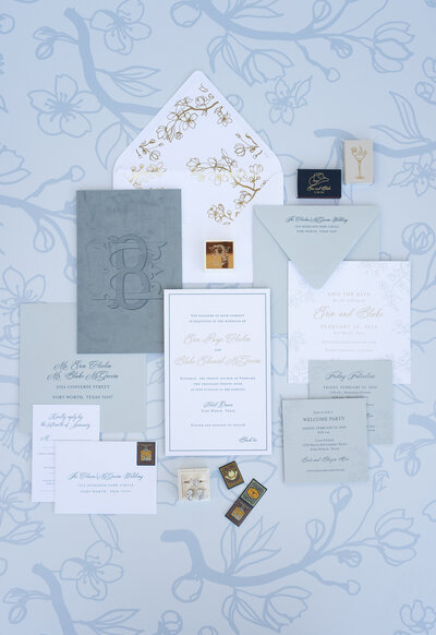 White and gray wedding invitations with gold foil by Southern Fried Paper